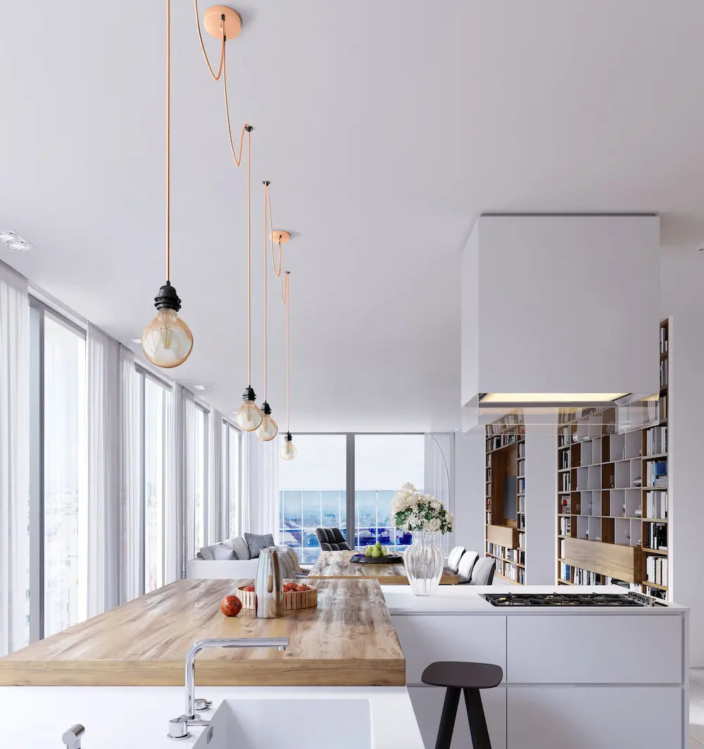 Suspensions 2 ampoules dans une cuisine blanche style moderne