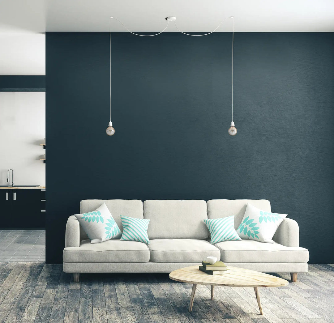 Canapé blanc mur foncé suspension HANG2 HOOPZI